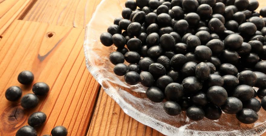 Black soybeans in a glass bowl