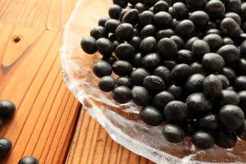 Black soybeans in a glass bowl