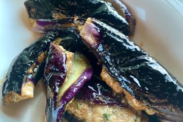 Stuffed eggplants on a white plate